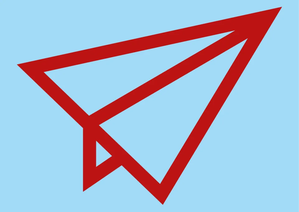 papieren vliegtuigje in rood en blauw