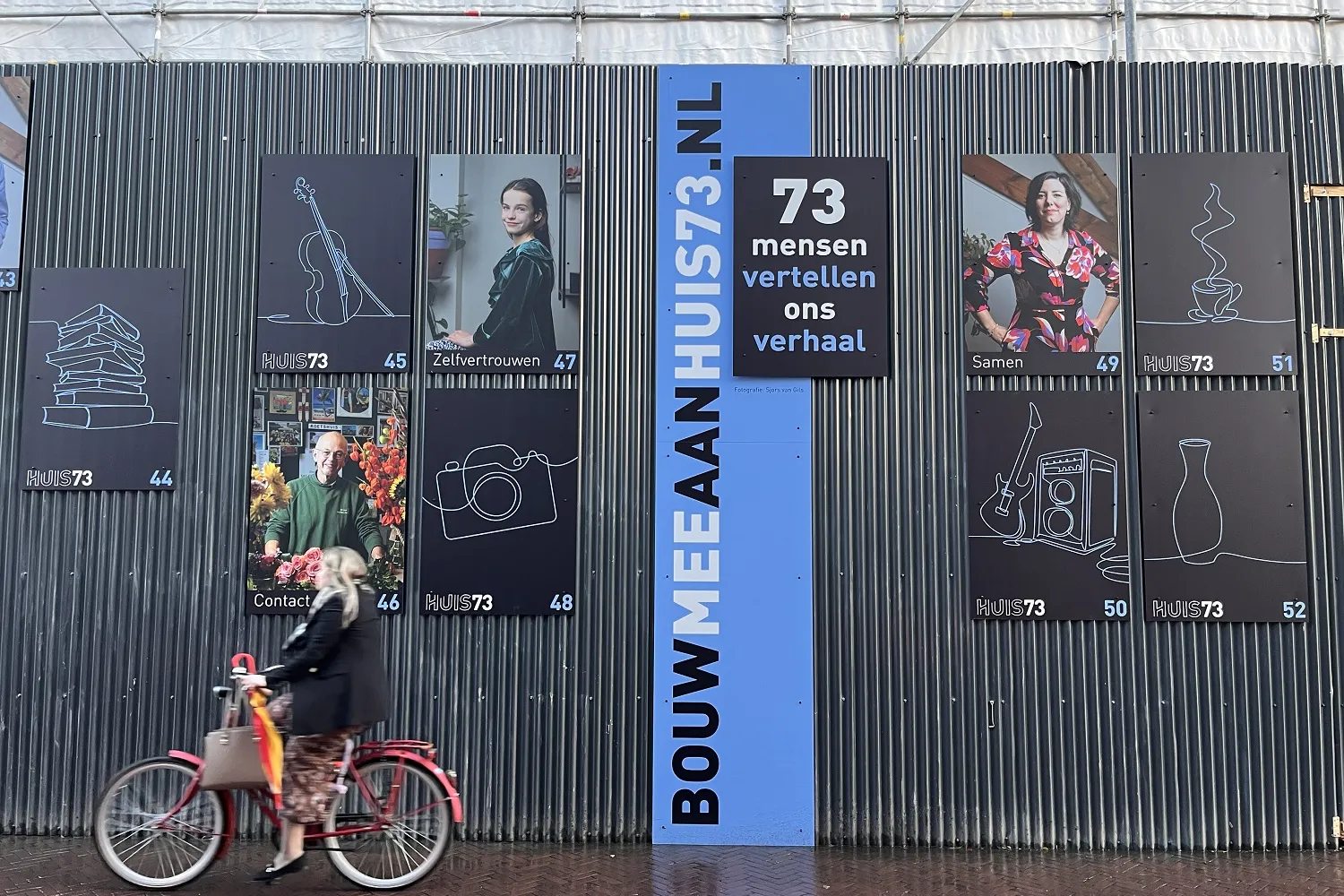 Bouwschutting met foto's 