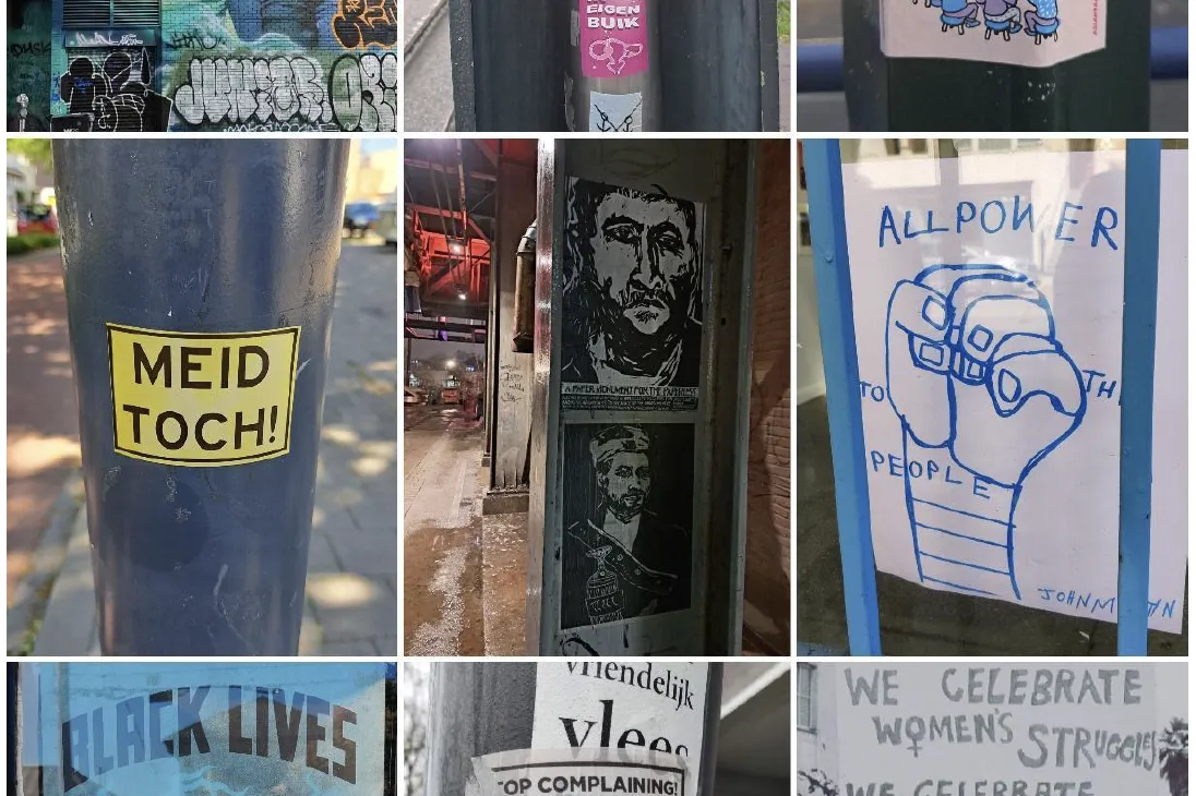 activistische stickers op straatmeubilair 