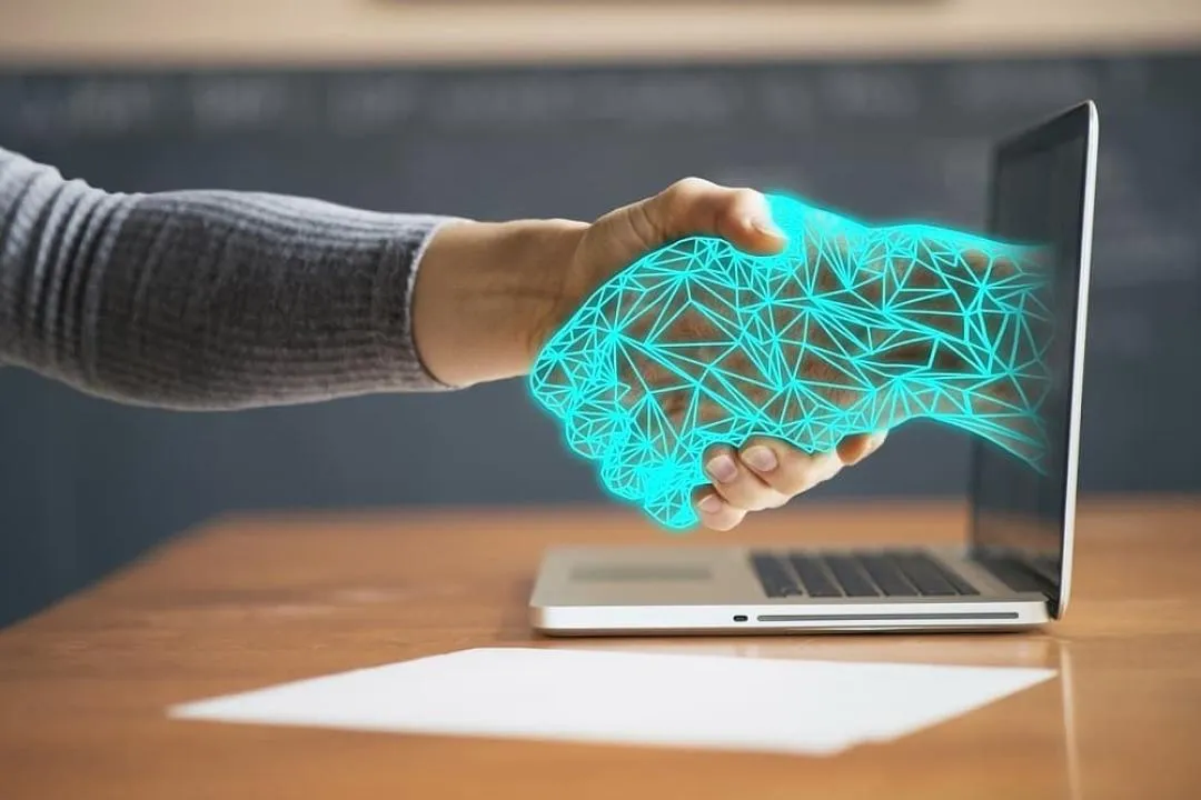 computer die hand geeft