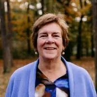 vrouw met blauw vest